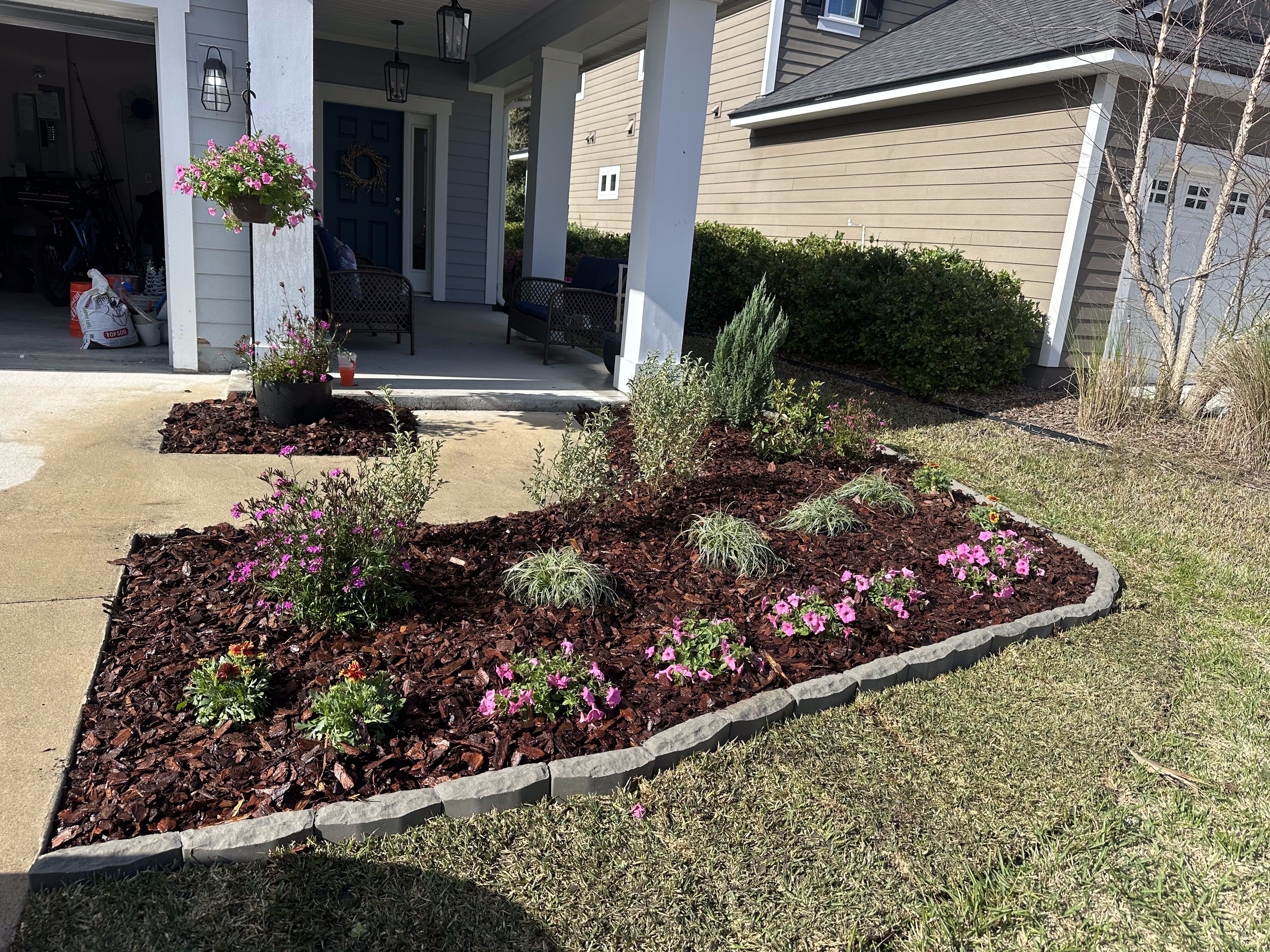 Image of front yard flower bed after Yard Remodel Jax make it ready for every season.